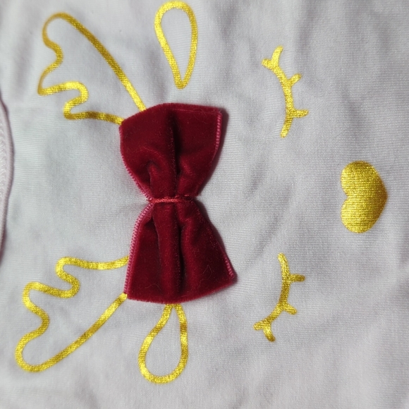 Cute pink holiday onesie with red bow and sleepy reindeer on front - Picture 2 of 5